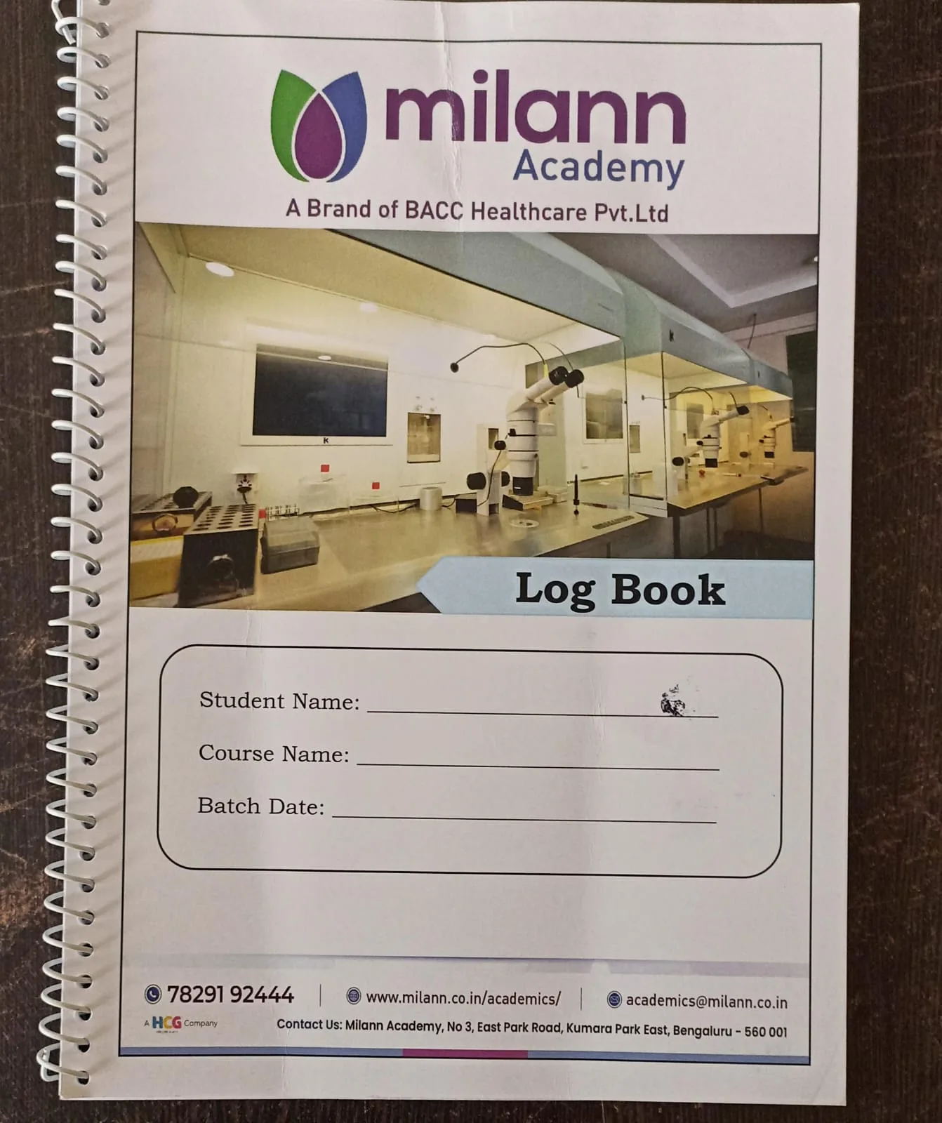 Printed academy logbook with blank record fields