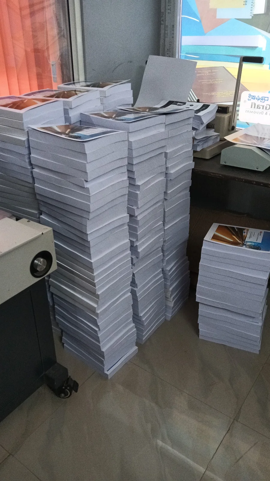 Completed print batches organised for delivery